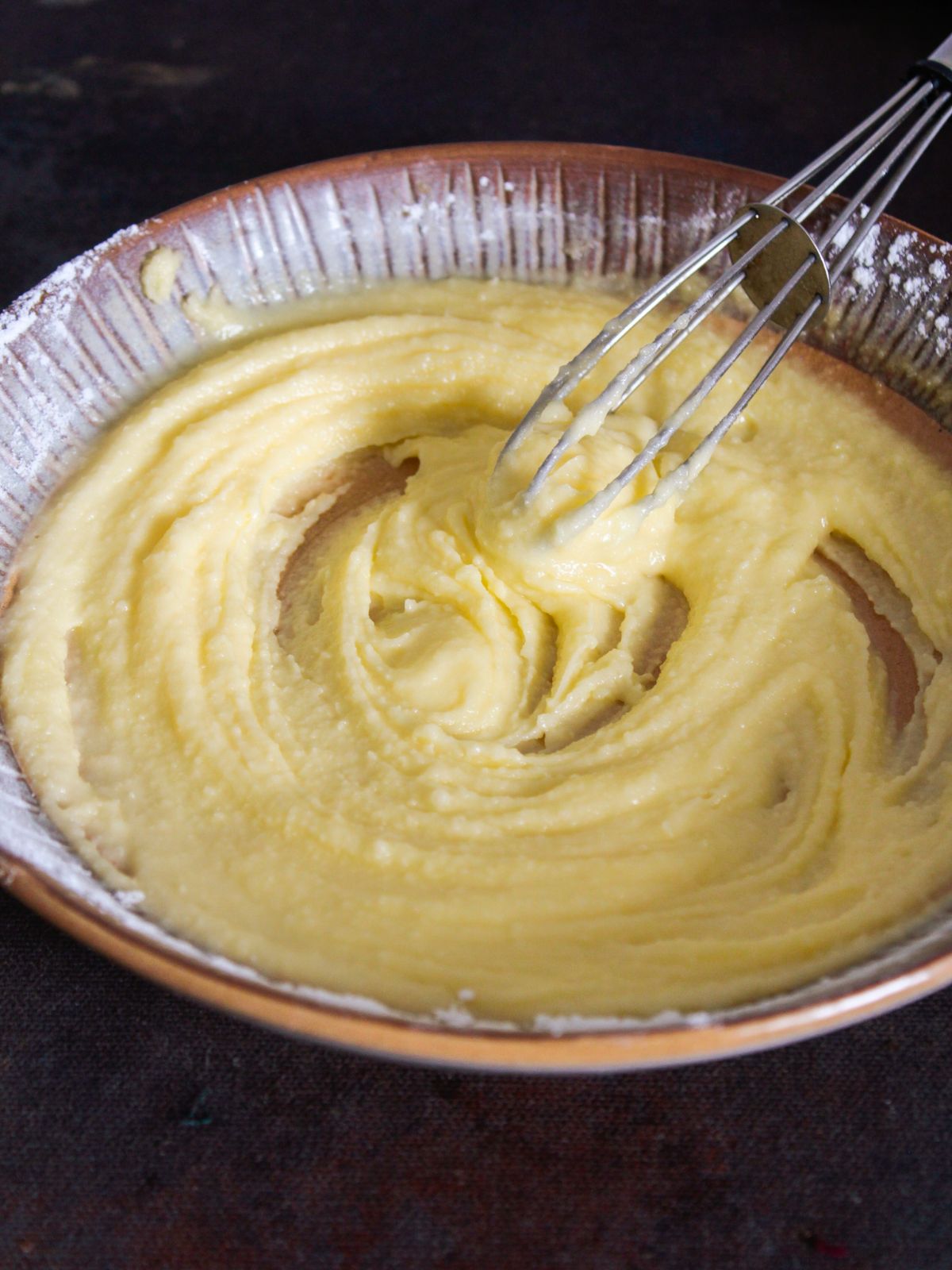 Whisk in a bowl of creamy butter