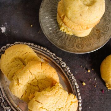 Stack of Naankhatai cookies on silver platter