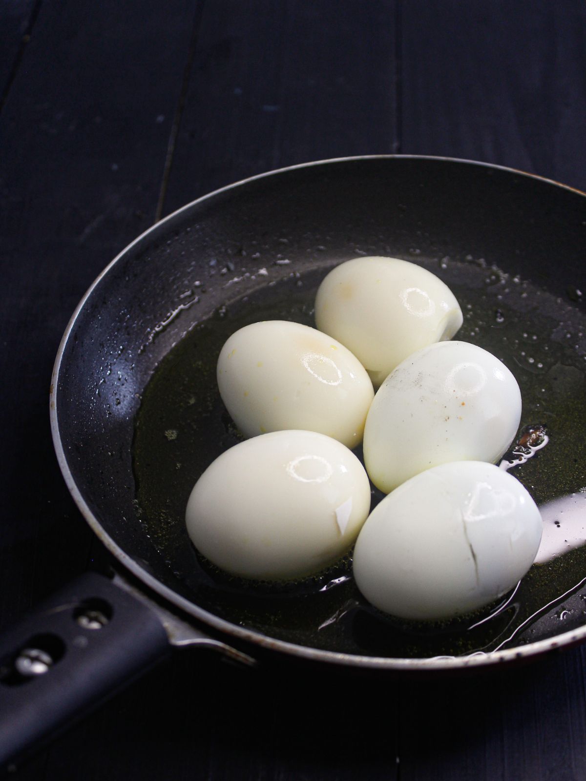 hard boiled eggs in skillet
