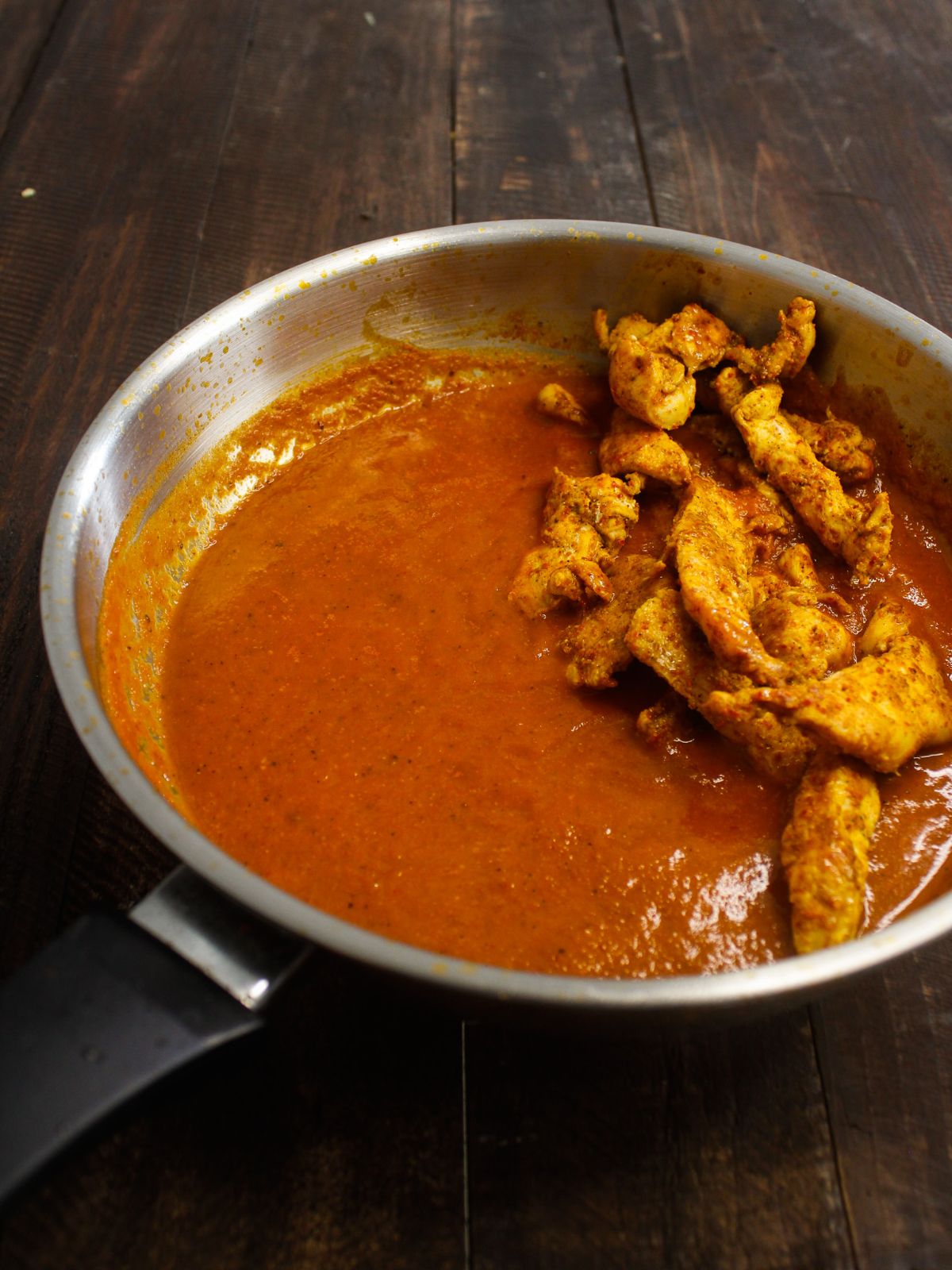 Add the prepared tandoori chicken to the mixture