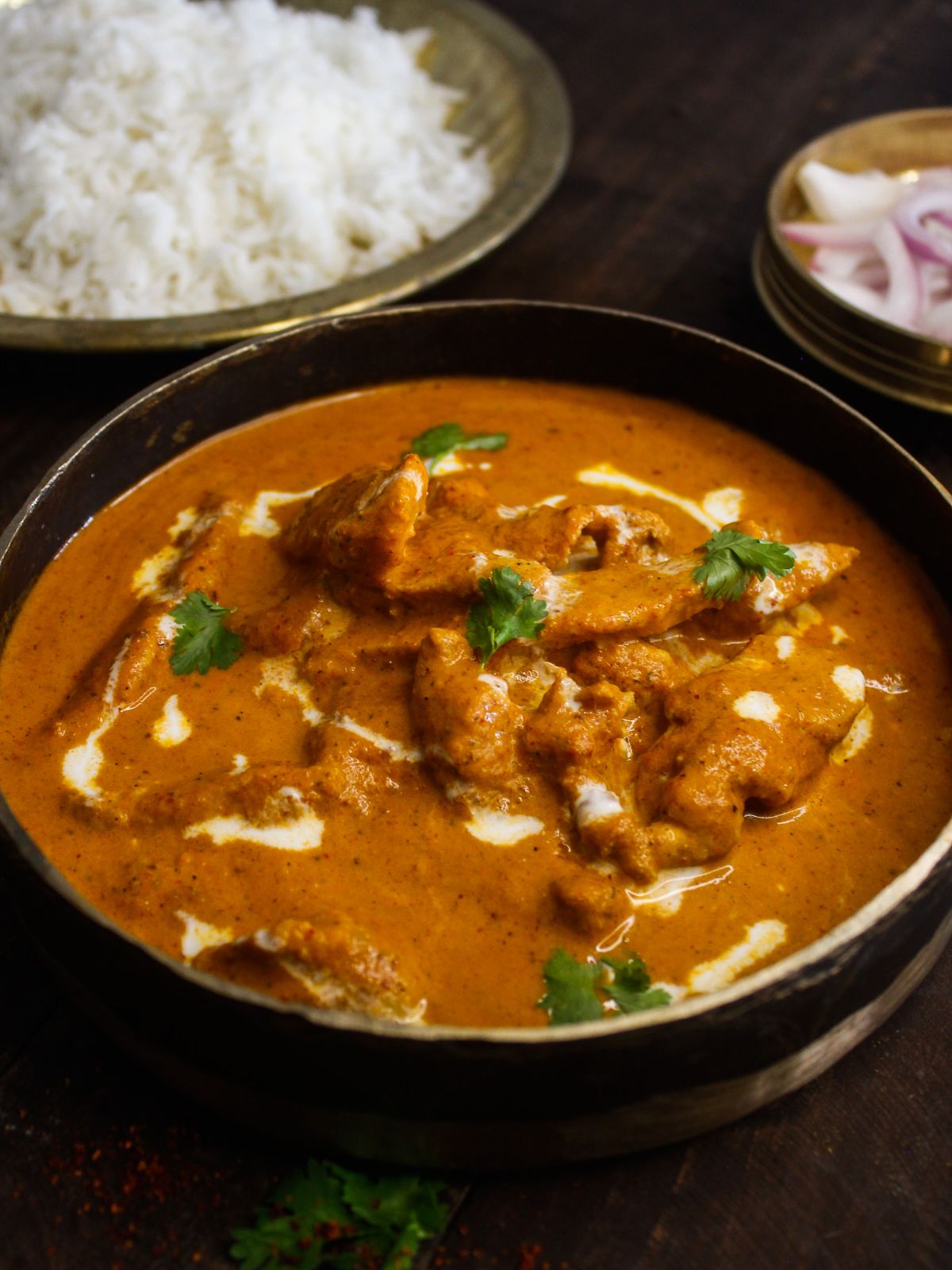 Butter Chicken served in a bowl with rice