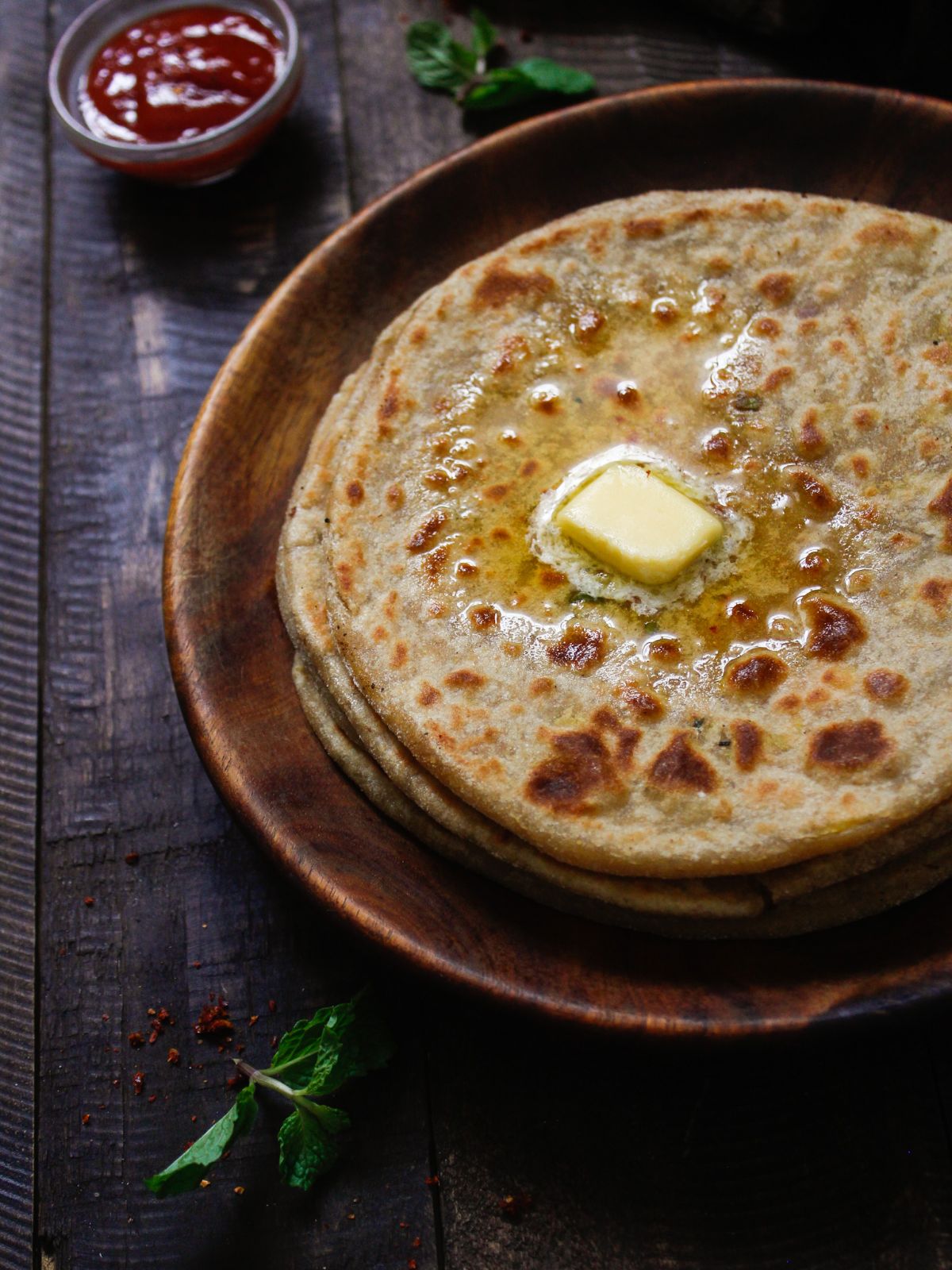 Paneer paratha served with butter ready to enjoy