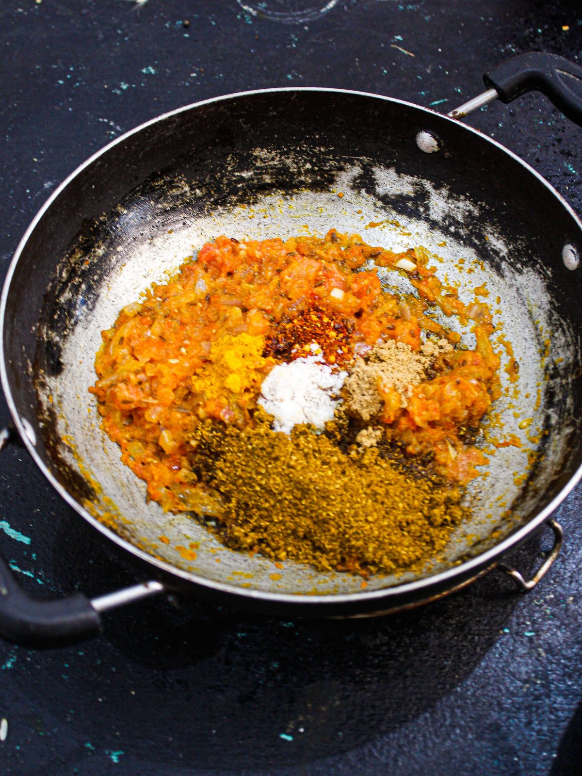 powdered spices in skillet