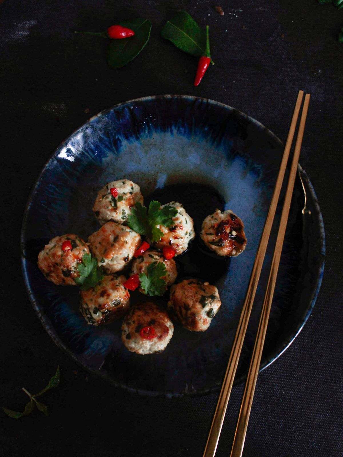 Thai Chicken Meatballs served with sauce and chopstick