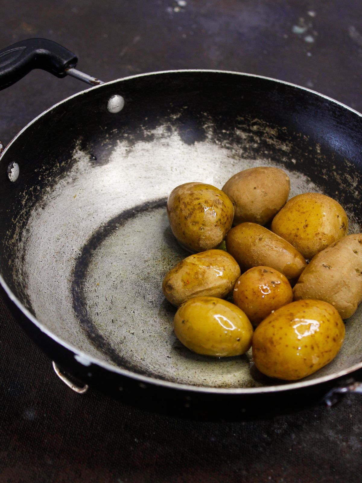 whole baby potatoes in skillet