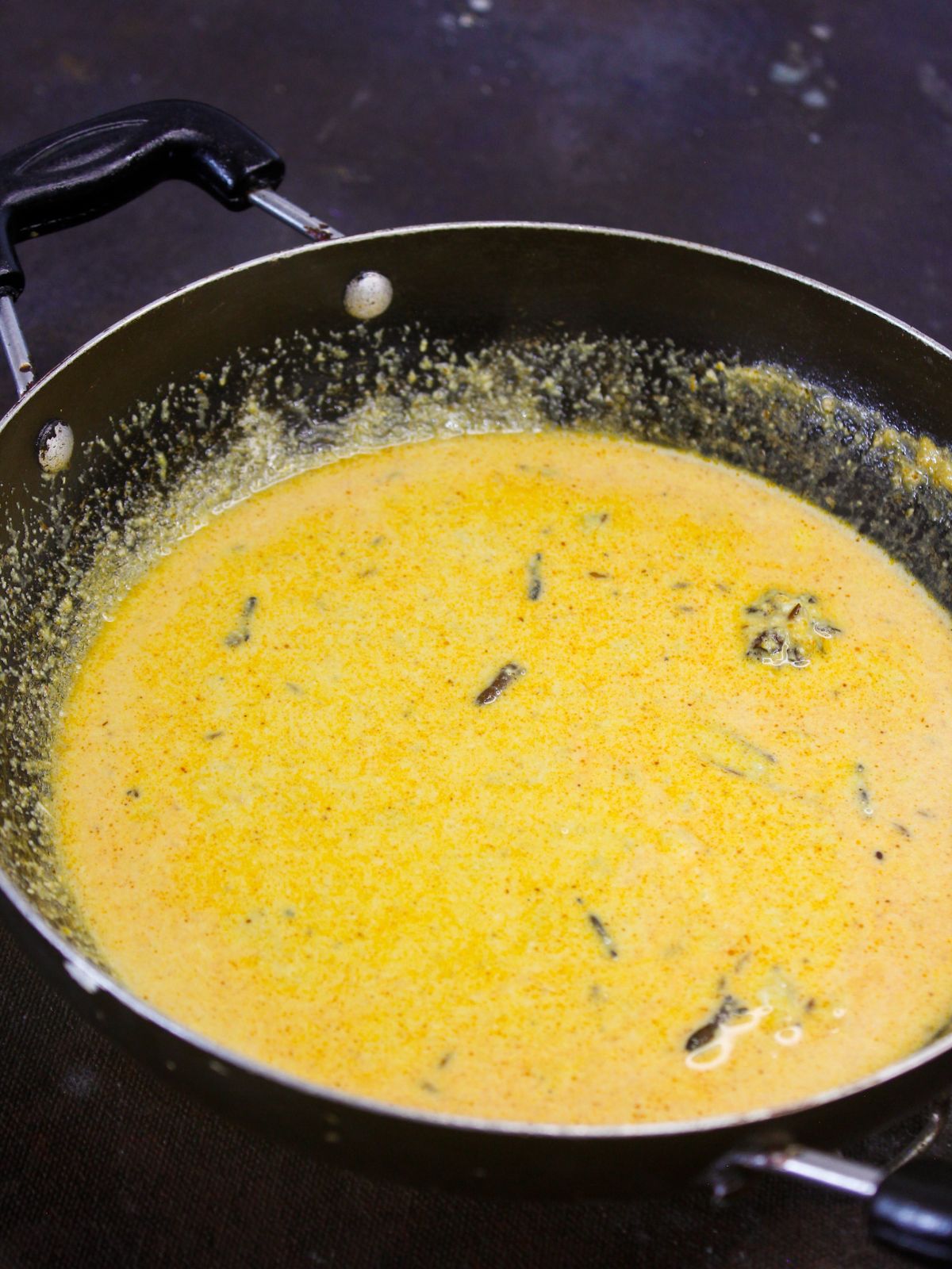 yellow curry in skillet