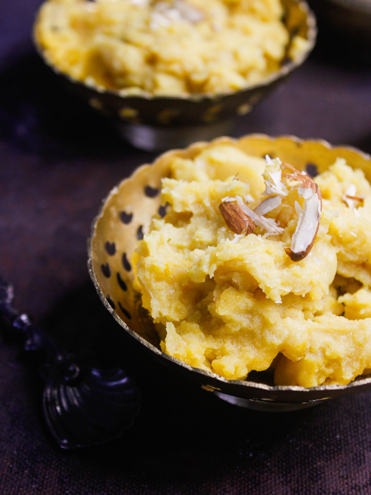 Sweet Besan Halwa served in a golden bowl
