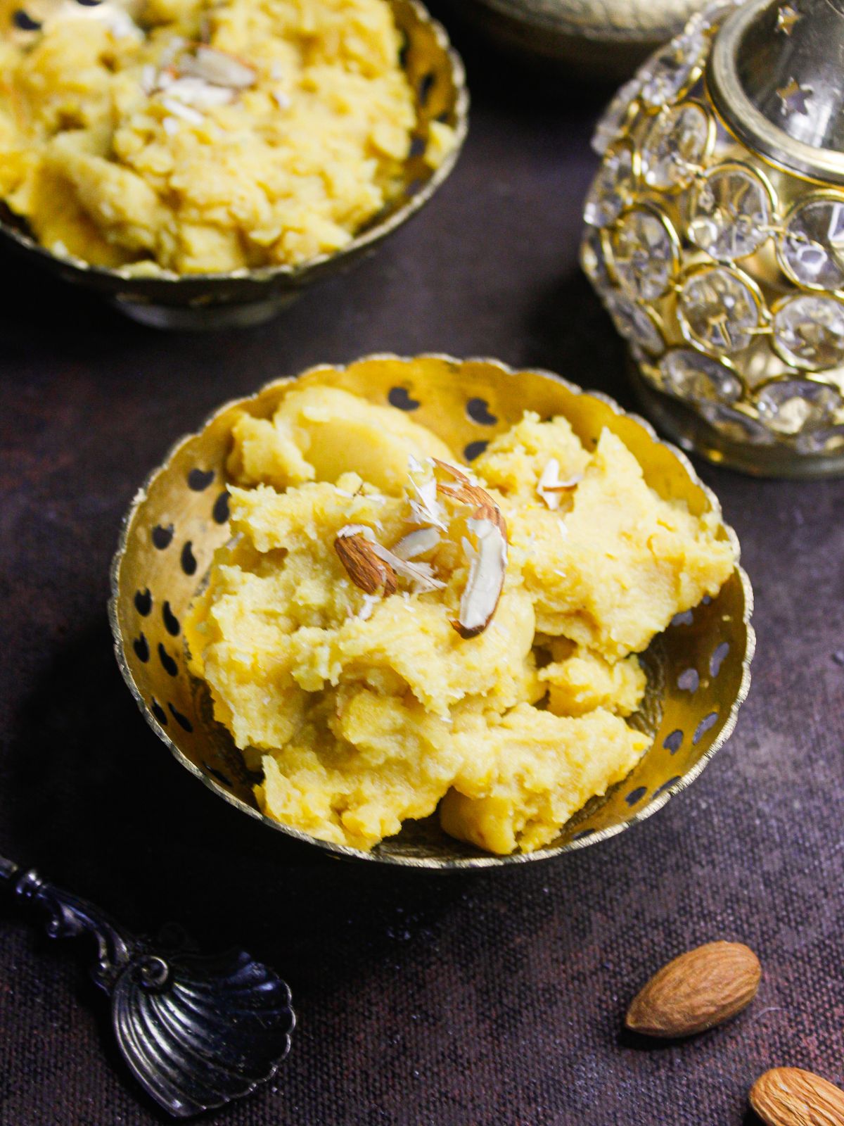 Besan Halwa: Rich Chickpea Flour Dessert decorated with almonds in the background