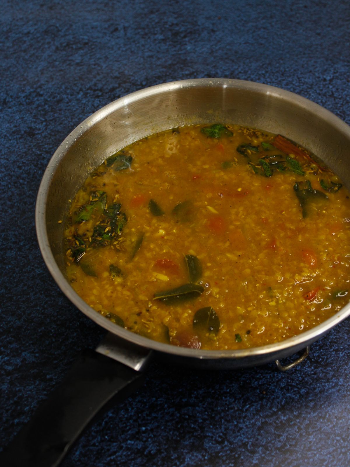 add lentils mixture from cooker to the pan