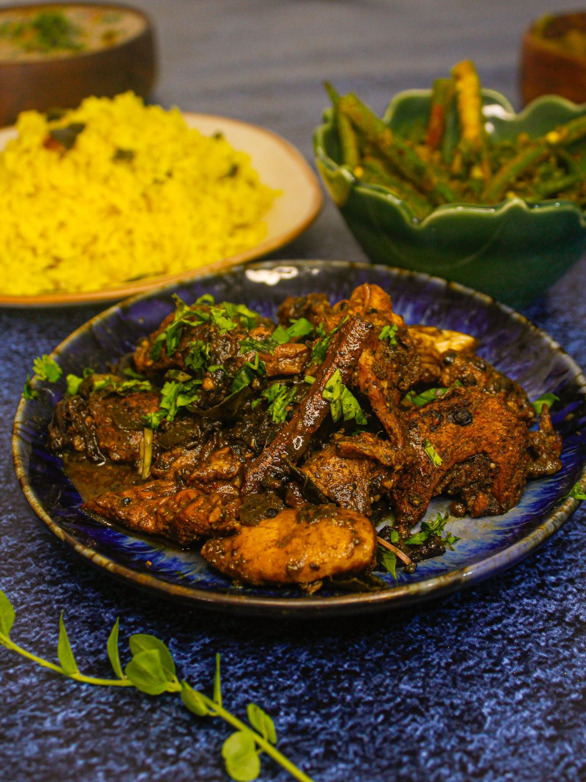 Side view image of Sri Lankan Sour Chicken: Ambulthiyal Curry