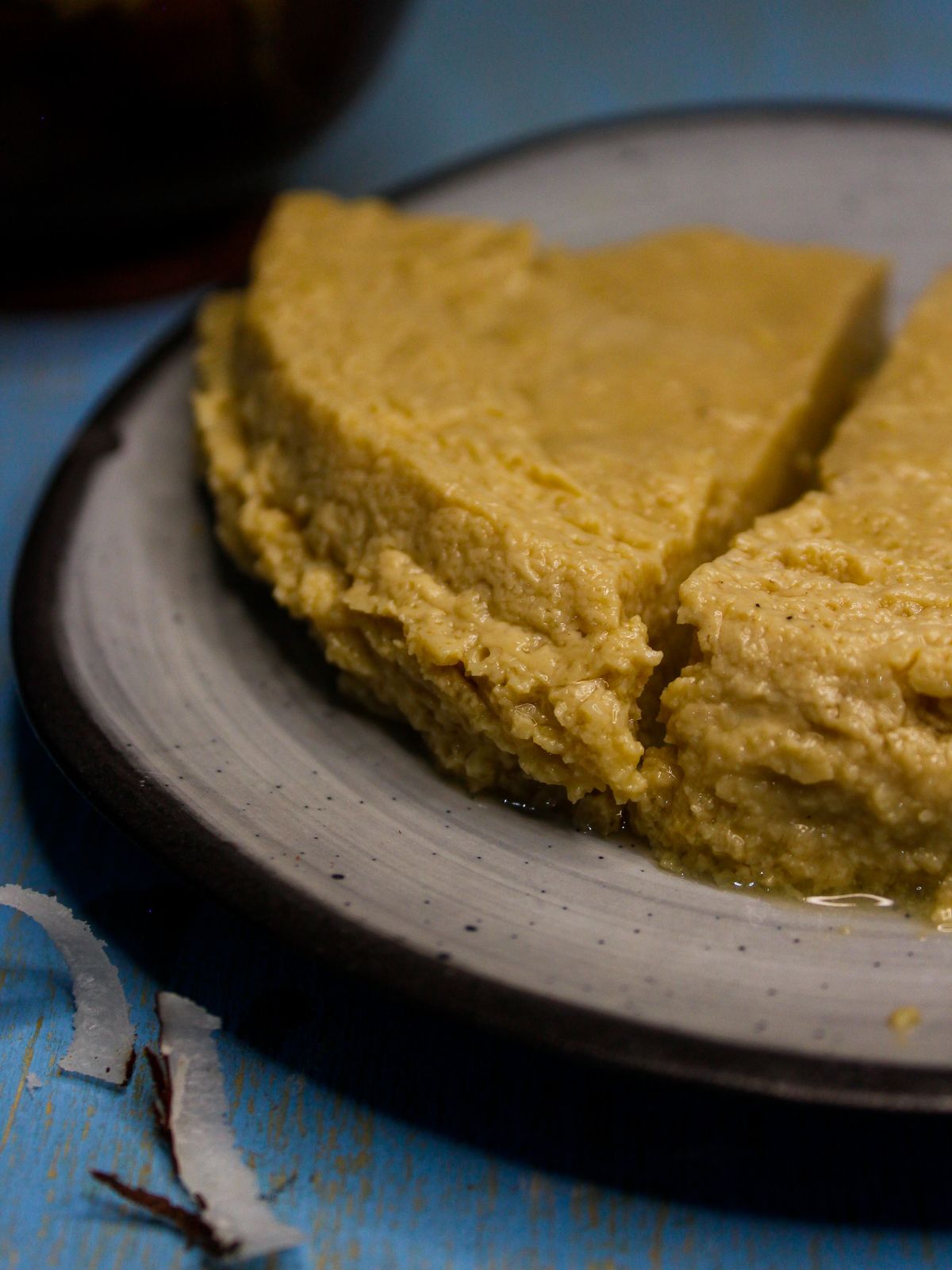 Side view image of Watalappan: Creamy Coconut Jaggery Pudding