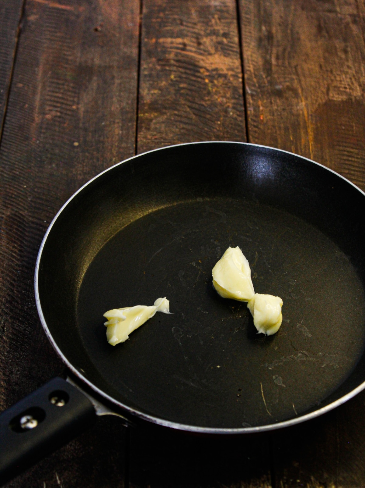 Take butter into the frying pan