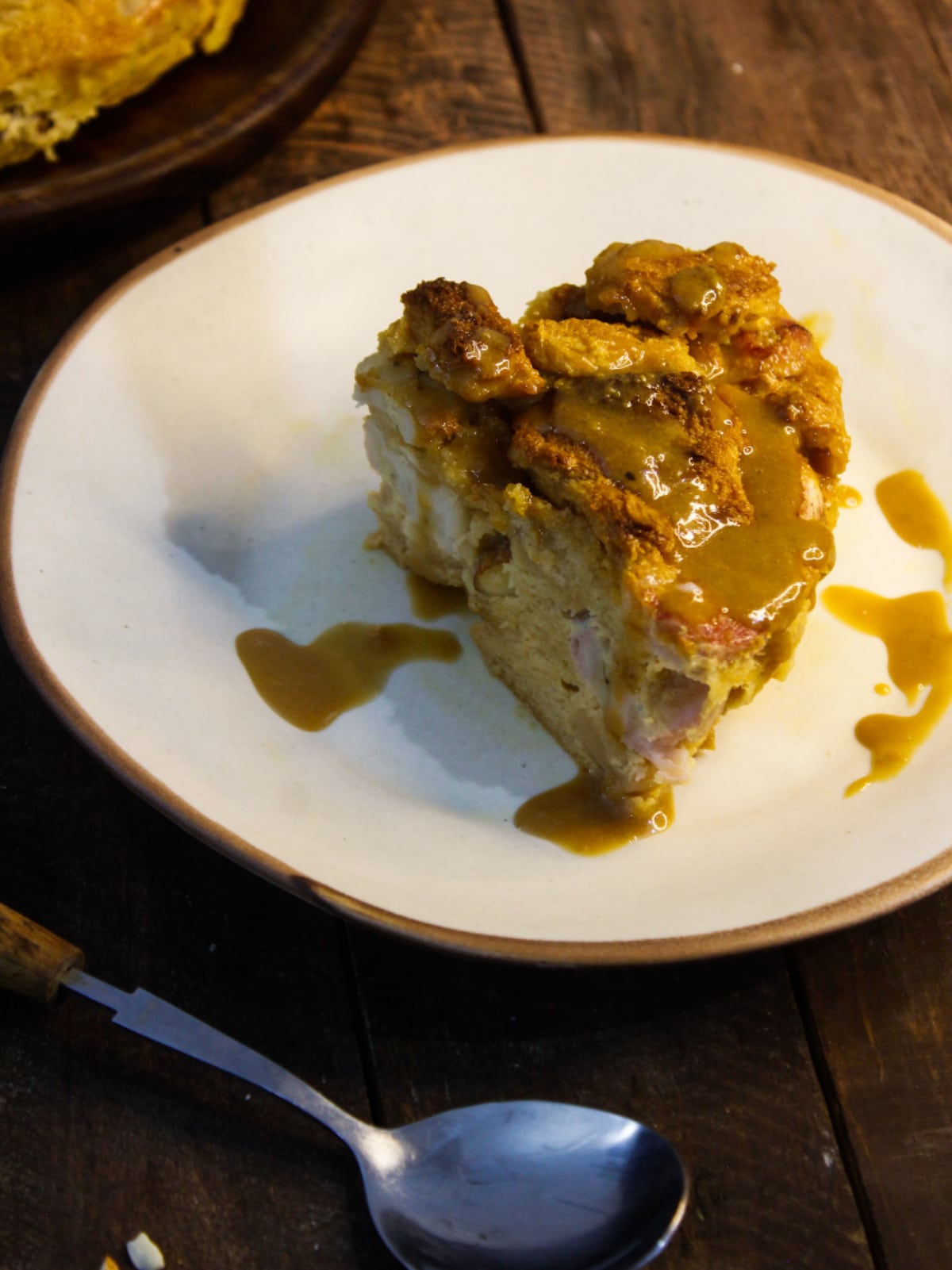 Easy Bread Pudding with Caramel Sauce served on a plate